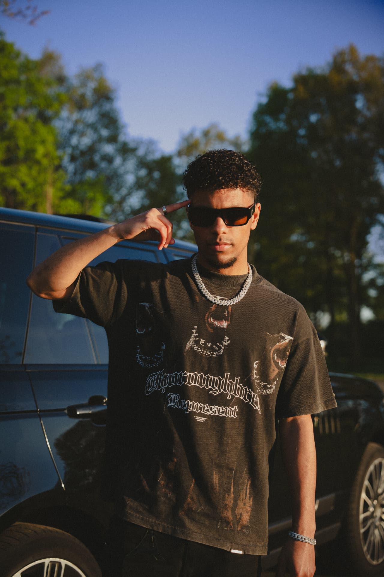 Portrait of ELIKIA outdoors at golden hour