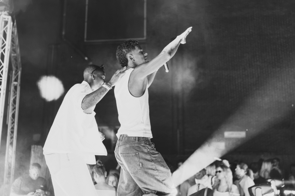 ELIKIA performing live on stage with the crowd in front